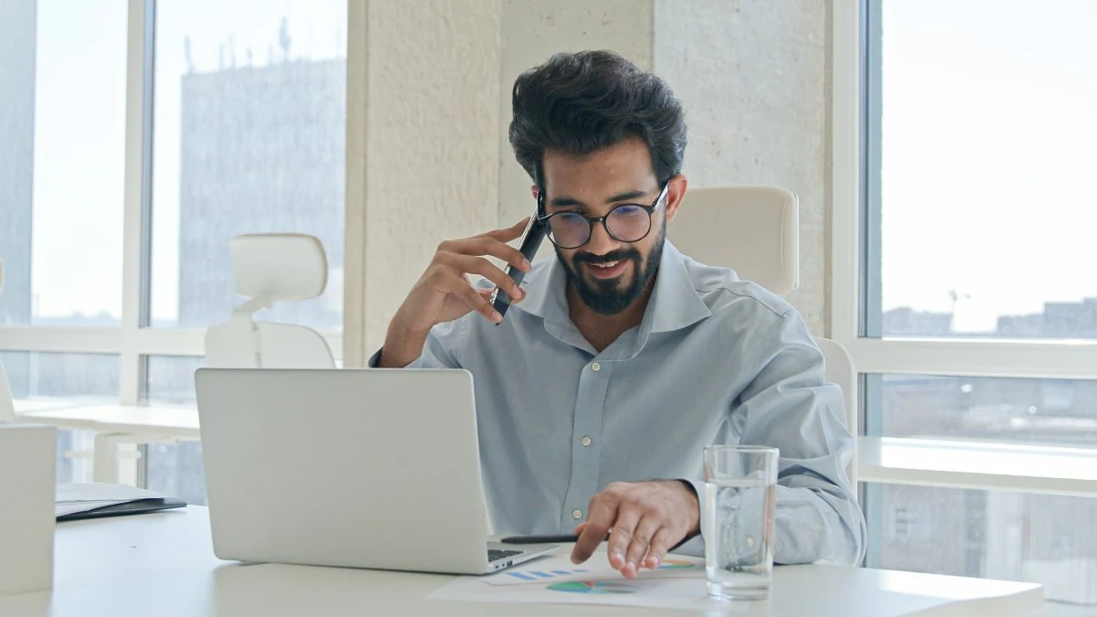 Sales leader comparing vendor options on a laptop